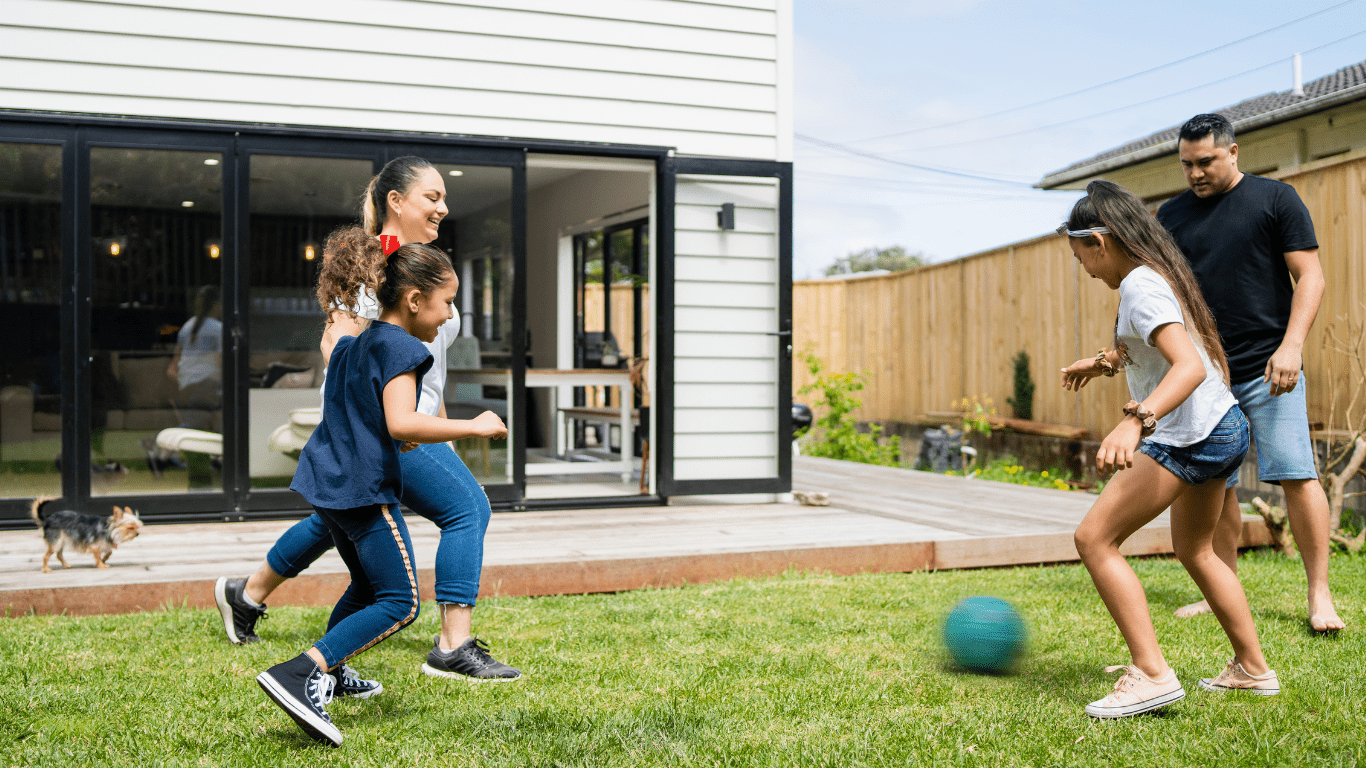 Family playing in the backyard, demonstrating an active and healthy lifestyle supported by bariatric nutrition advice